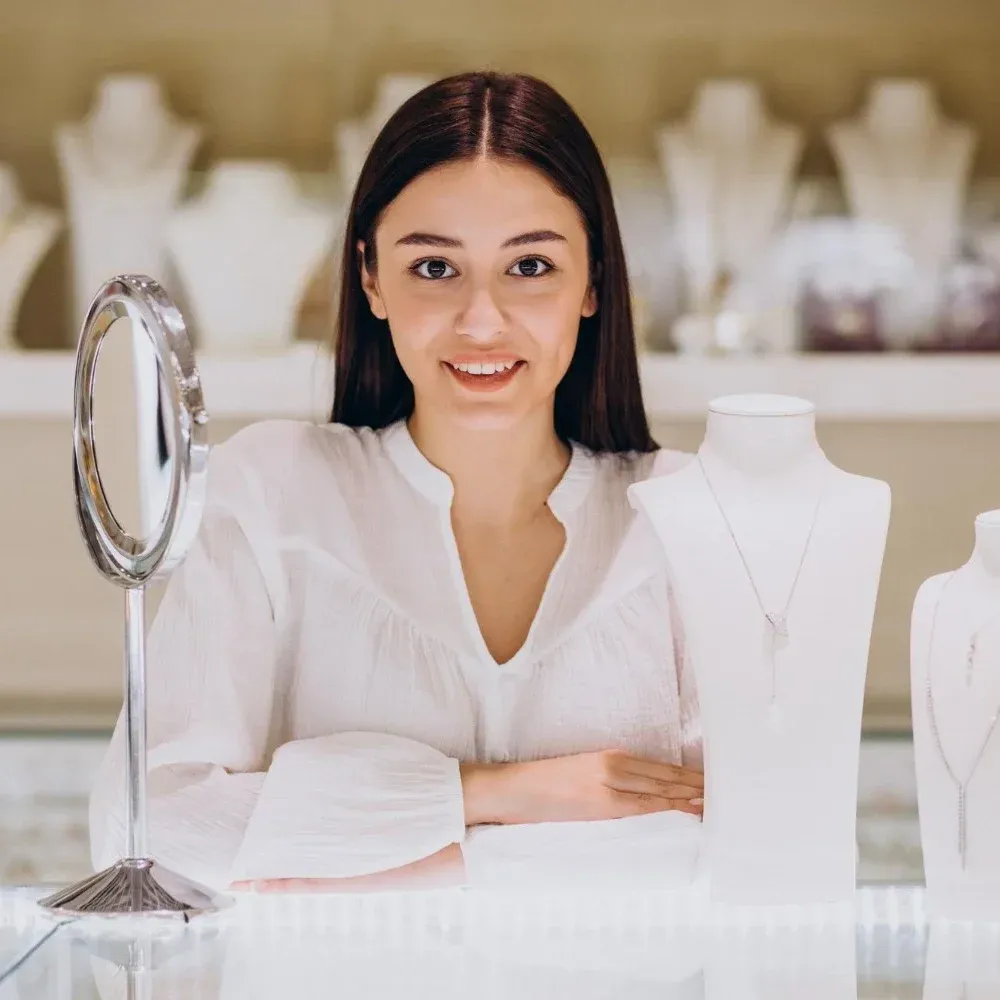 Female jewelry consultant at jewelry shop