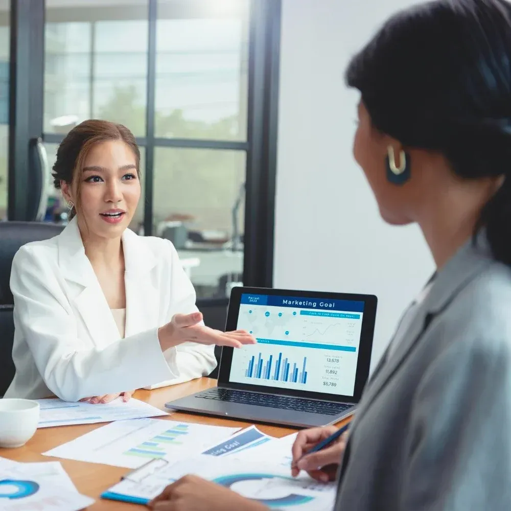 Group of Asian business people meeting about jewelry market analysis