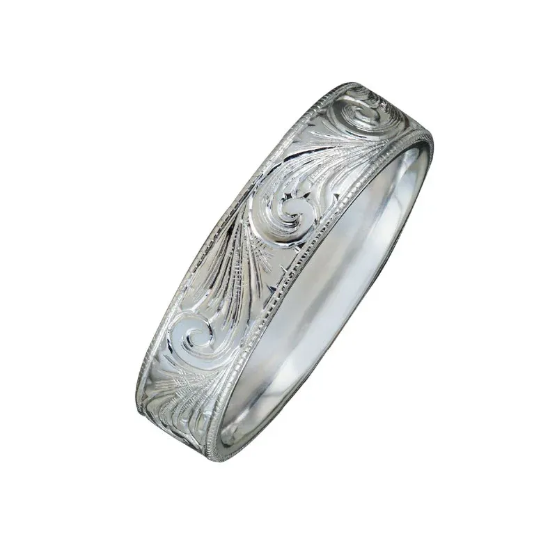 close up of a silver wedding ring close up of a silver wedding ring