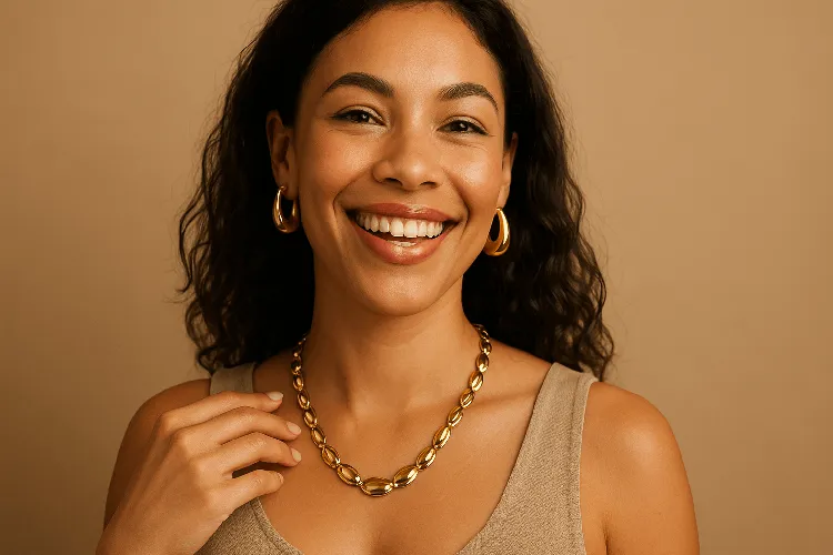 Confident woman wearing polished brass jewelry Confident woman wearing polished brass jewelry