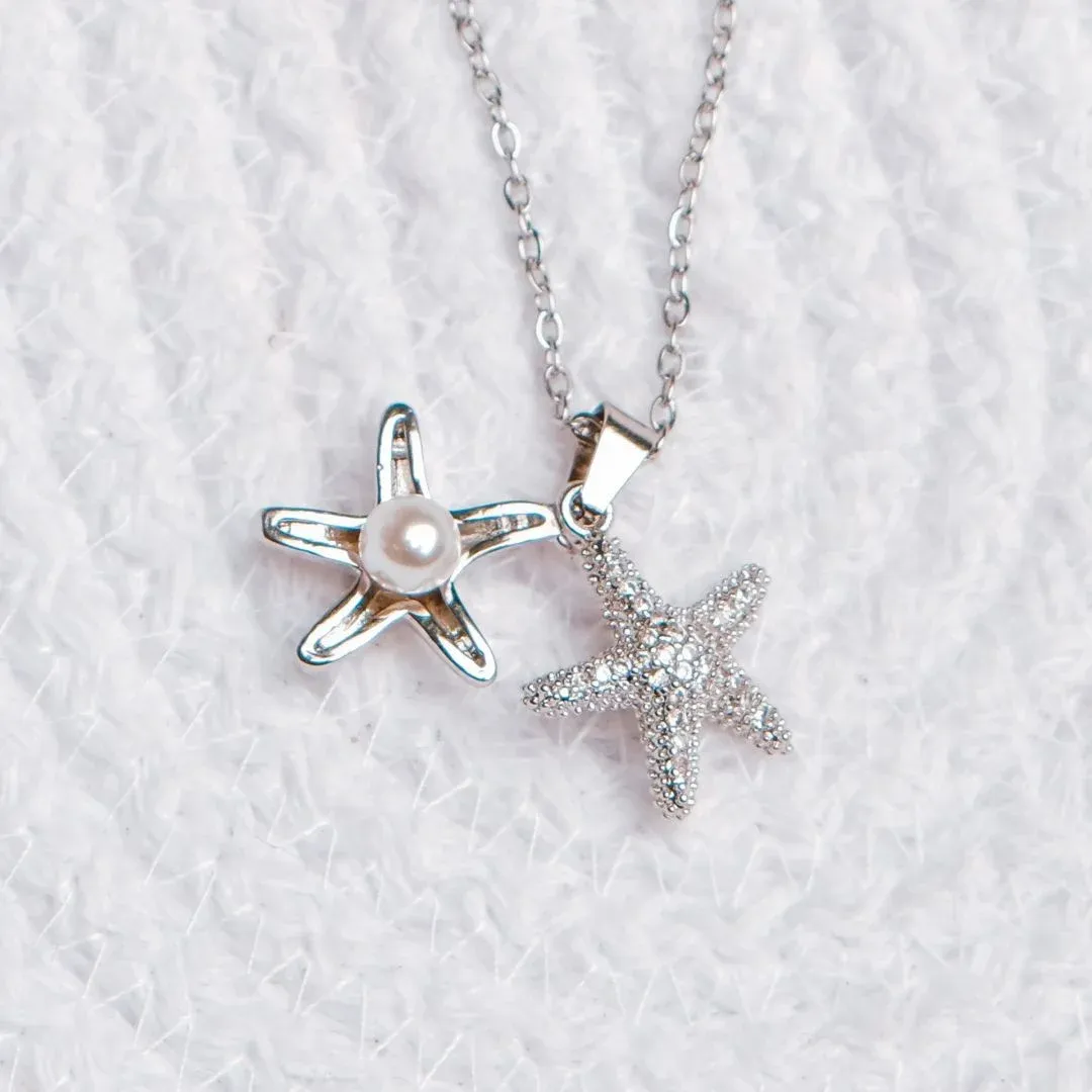 Silver starfish pendants on a delicate chain Silver starfish pendants on a delicate chain