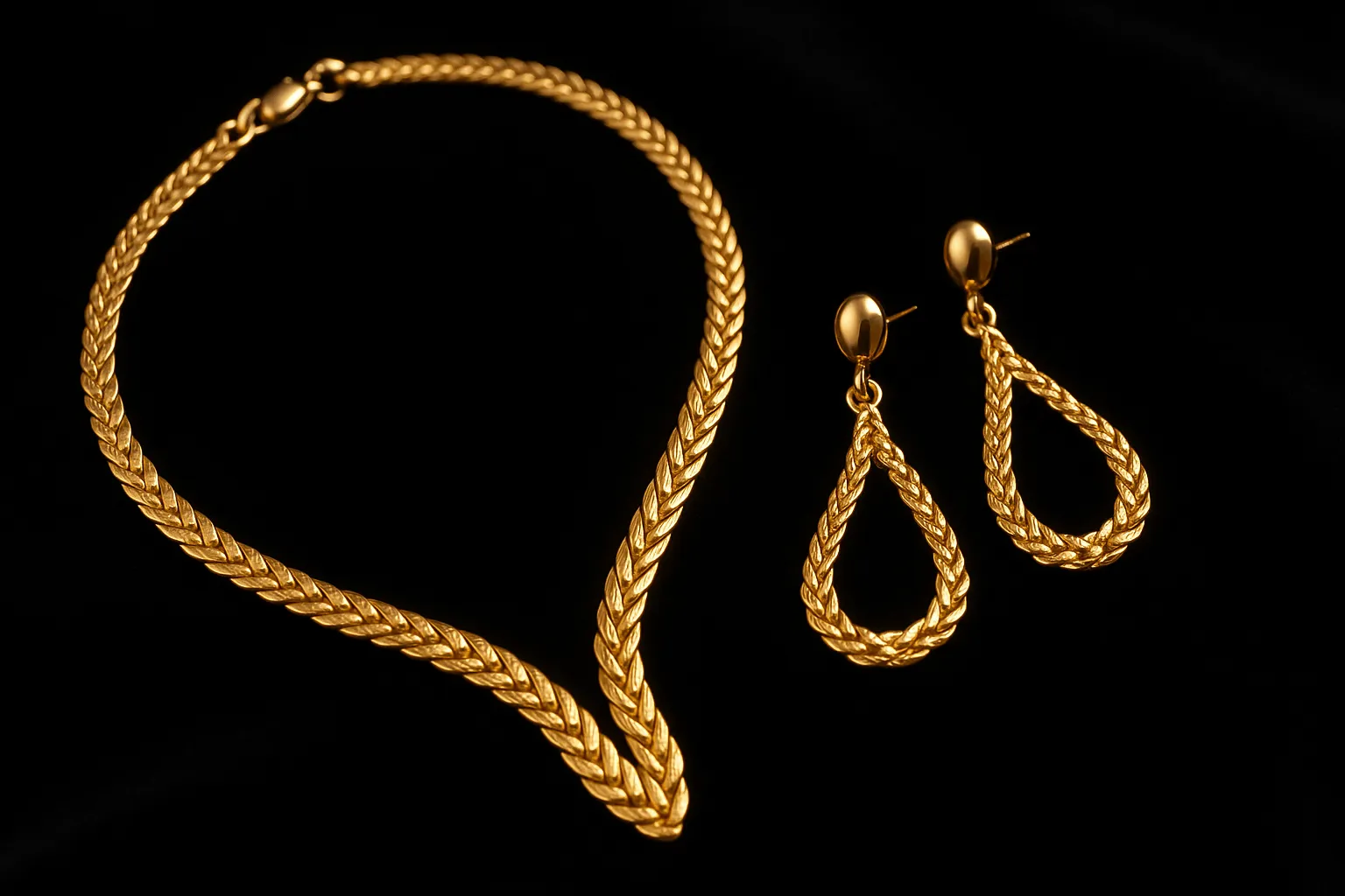Luxurious gold jewelry set featuring a necklace and earrings