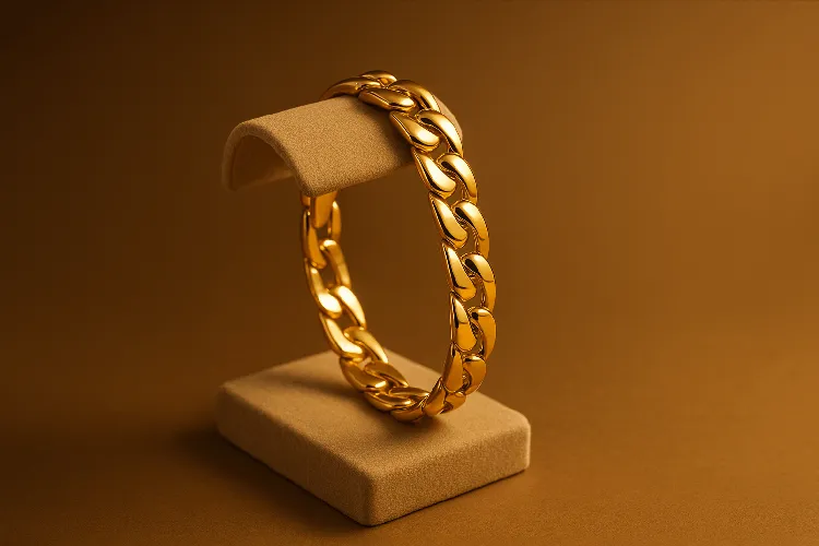 Polished 18k gold bracelet on display. Polished 18k gold bracelet on display.