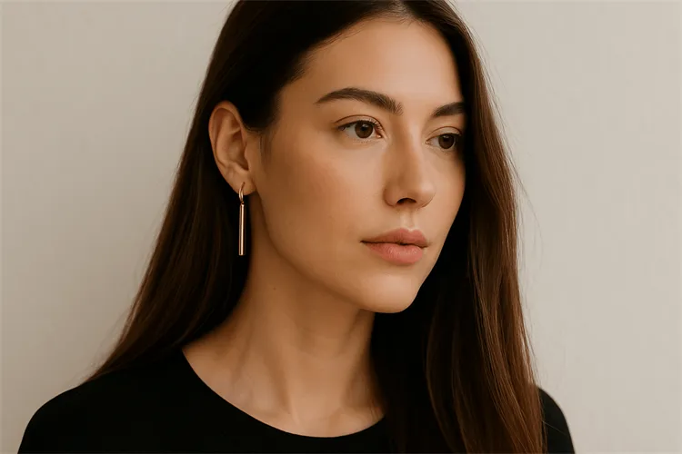 Asian woman with long hair and hoop earrings Asian woman with long hair and hoop earrings