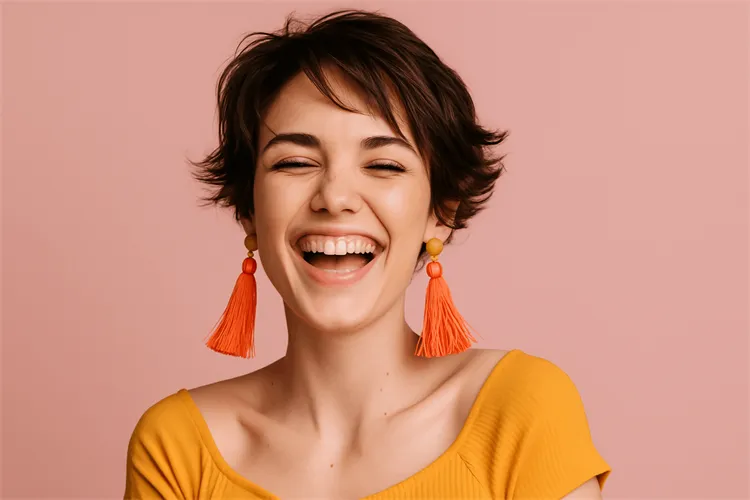 Tassel earrings on a short-haired woman Tassel earrings on a short-haired woman