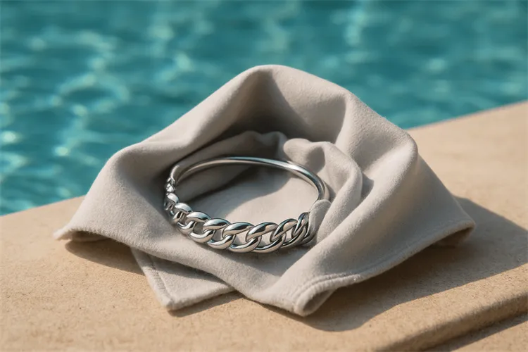 Silver jewelry wrapped for protection near a pool. Silver jewelry wrapped for protection near a pool.