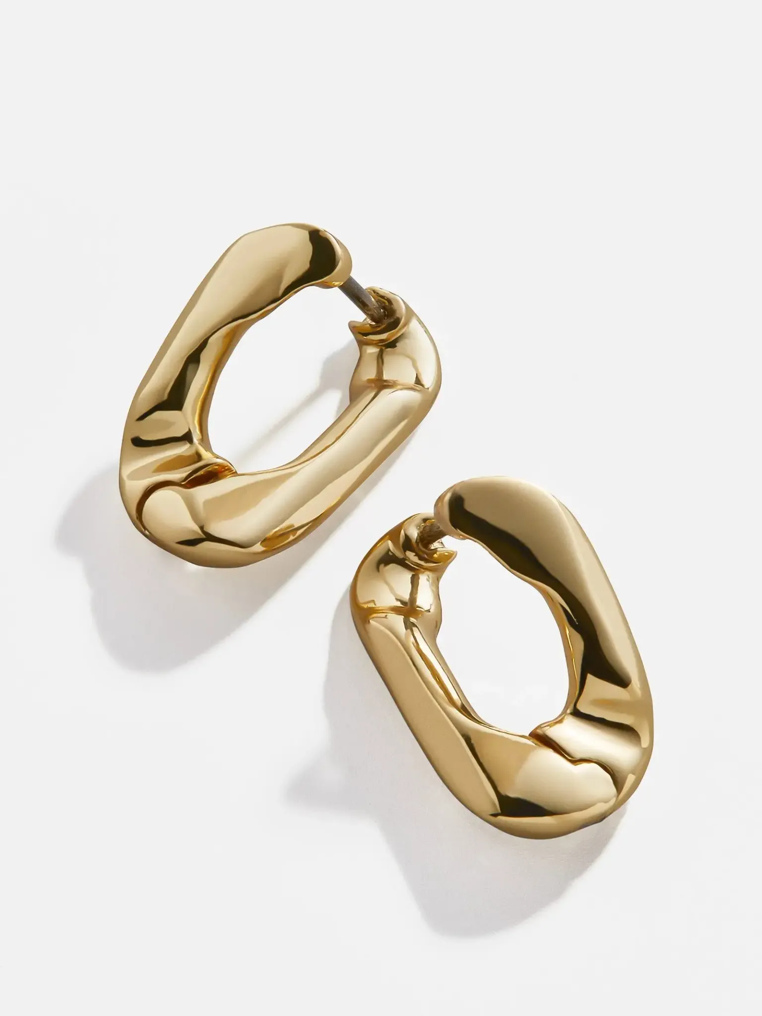 Chunky hoop earrings with a sculpted twisted look