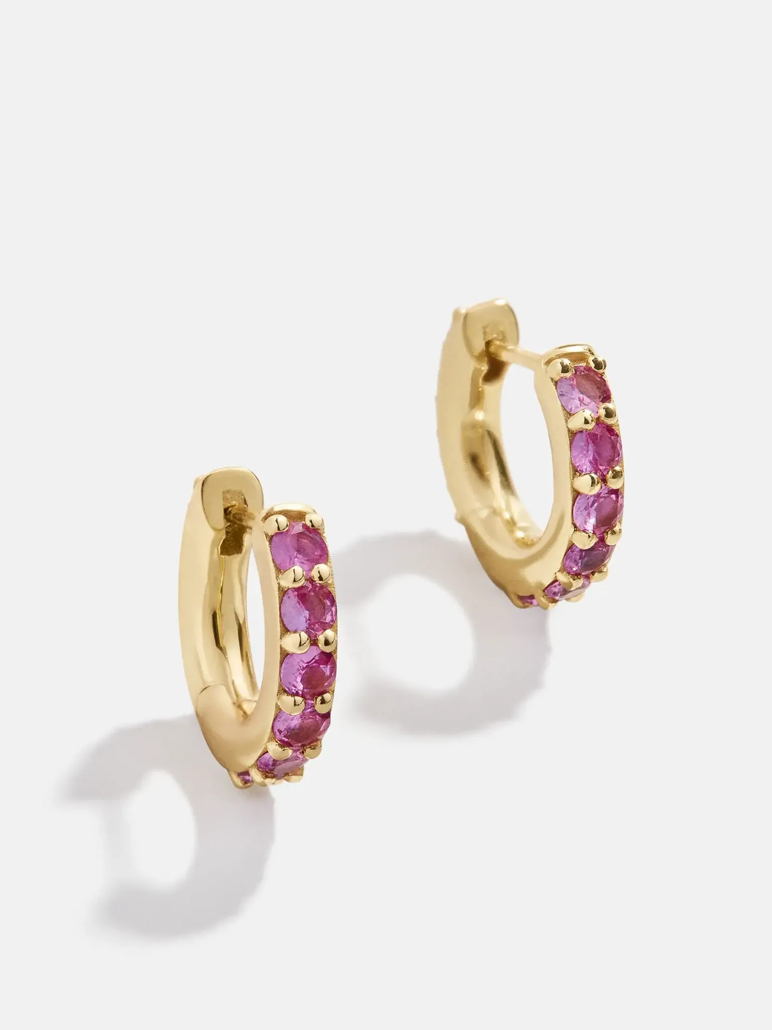 Small hoop earrings with pink gemstones