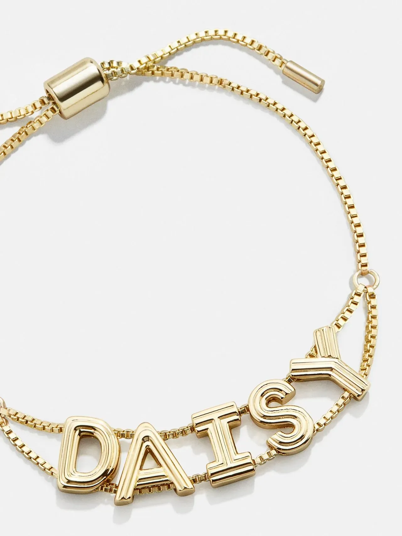 bracelet with DAISY letters in a bold font
