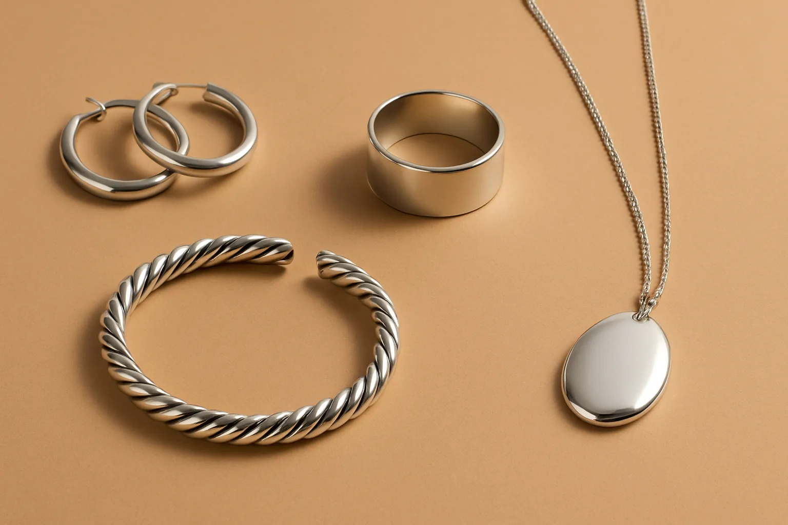 Display a variety of silver jewelry materials to highlight their elegance and durability.