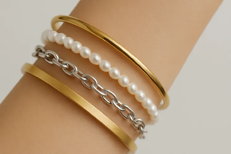 Simplified 3-5 bracelet stack for a chic look. Simplified 3-5 bracelet stack for a chic look.