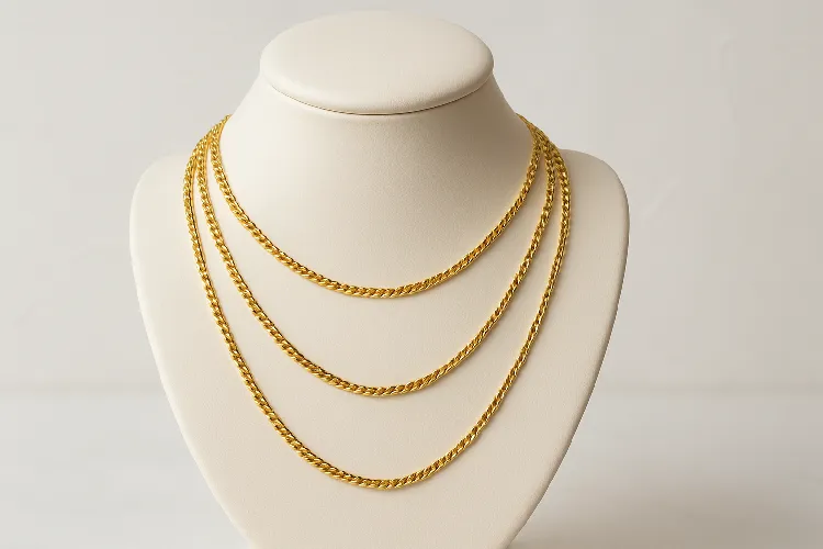 Layered gold necklaces of different lengths Layered gold necklaces of different lengths