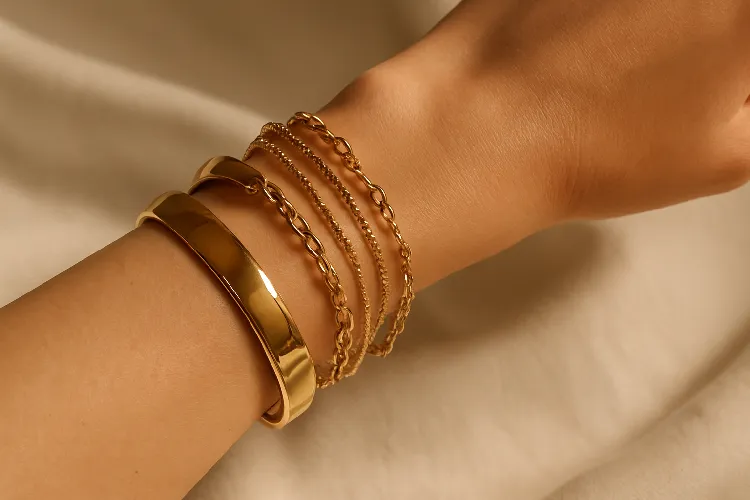 Balanced bracelet stack with varying thickness. Balanced bracelet stack with varying thickness.