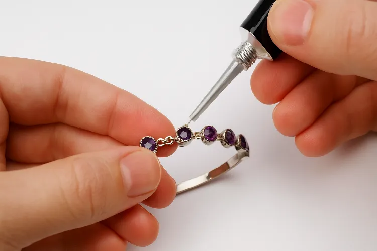 Repairing loose gemstone on costume jewelry Repairing loose gemstone on costume jewelry