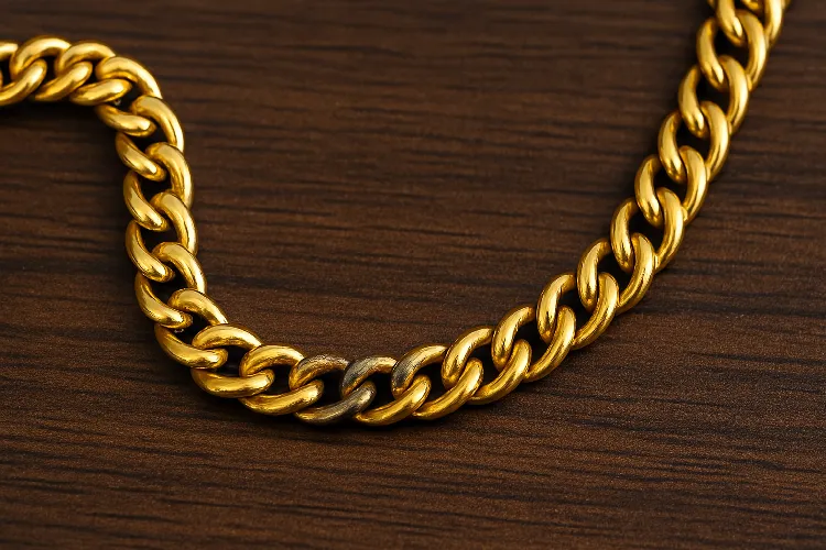 Worn and faded gold necklaces suggest fake gold or gilding. Worn and faded gold necklaces suggest fake gold or gilding.