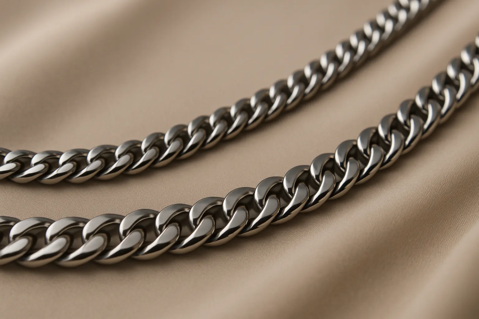 Close-up of stainless steel curb chain necklace