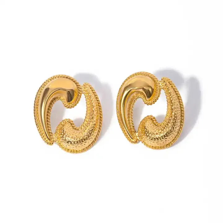Copper abstract shaped earrings with a textured finish