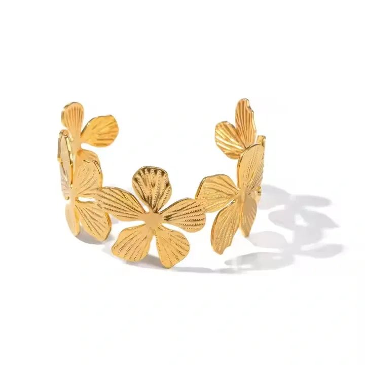 Copper bracelet with floral design featuring multiple flowers