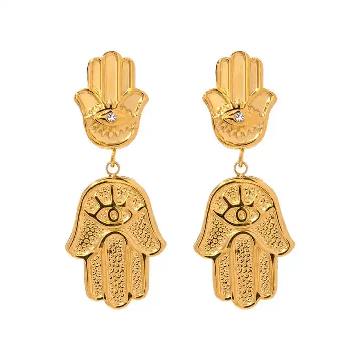 Copper earrings featuring a hamsa hand with an eye detail