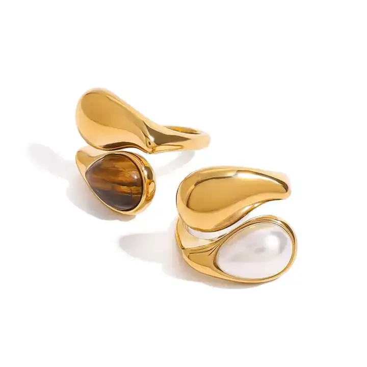 Copper teardrop rings with pearl and tigers eye stones
