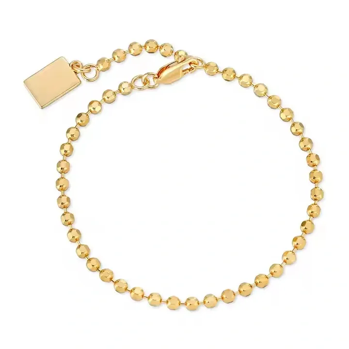 Gold beaded bracelet with square charm pendant