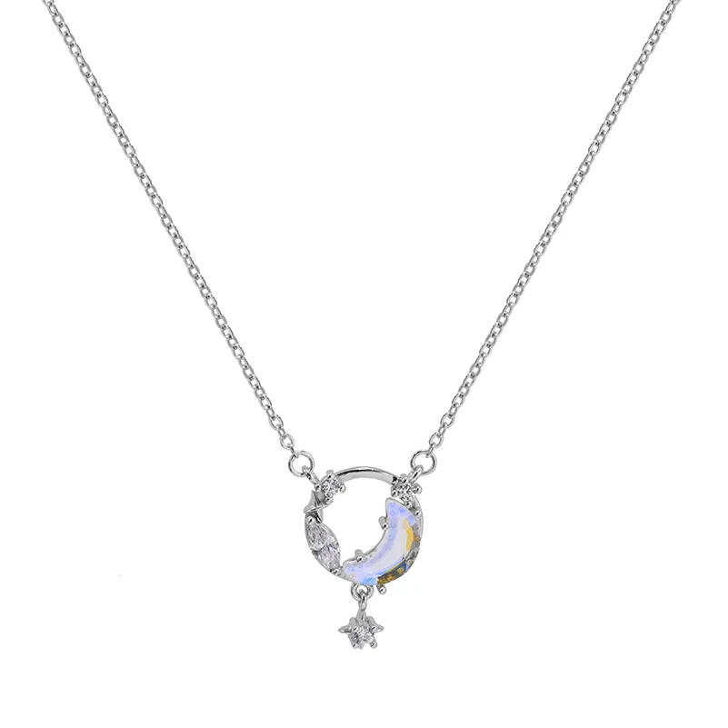 Silver crescent moon necklace with crystal accents