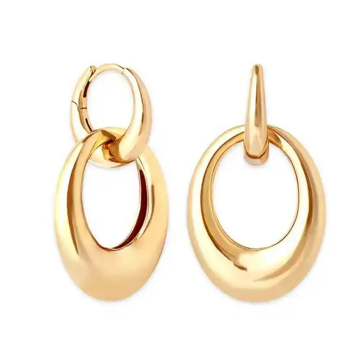 Silver hoop earrings with bold gold tone oval drops