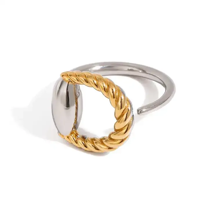 Titanium open ring with twisted gold rope and smooth silver