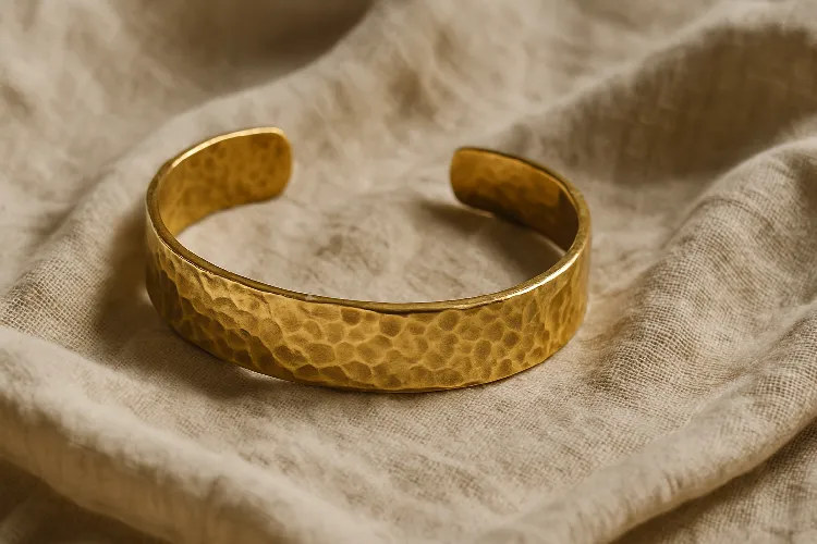 A hand-hammered golden bracelet with a Bohemian style A hand-hammered golden bracelet with a Bohemian style