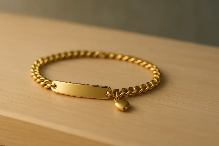 Custom stainless steel anklet with a gold finish and charm, highlighting its sleek design Custom stainless steel anklet with a gold finish and charm, highlighting its sleek design