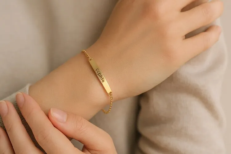 Personalized gold bracelet with engraving, symbolizing meaningful jewelry Personalized gold bracelet with engraving, symbolizing meaningful jewelry
