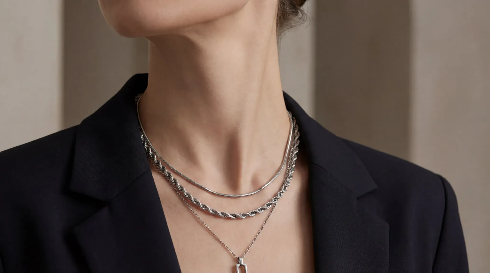 layered stainless steel necklace closeup index 14096x2286