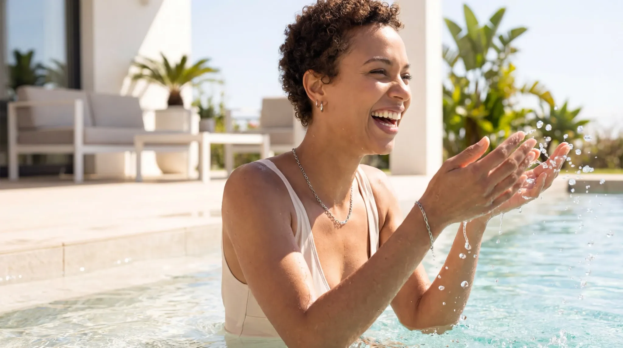 minimalist jewelry pool lifestyle shot index 14096x2286