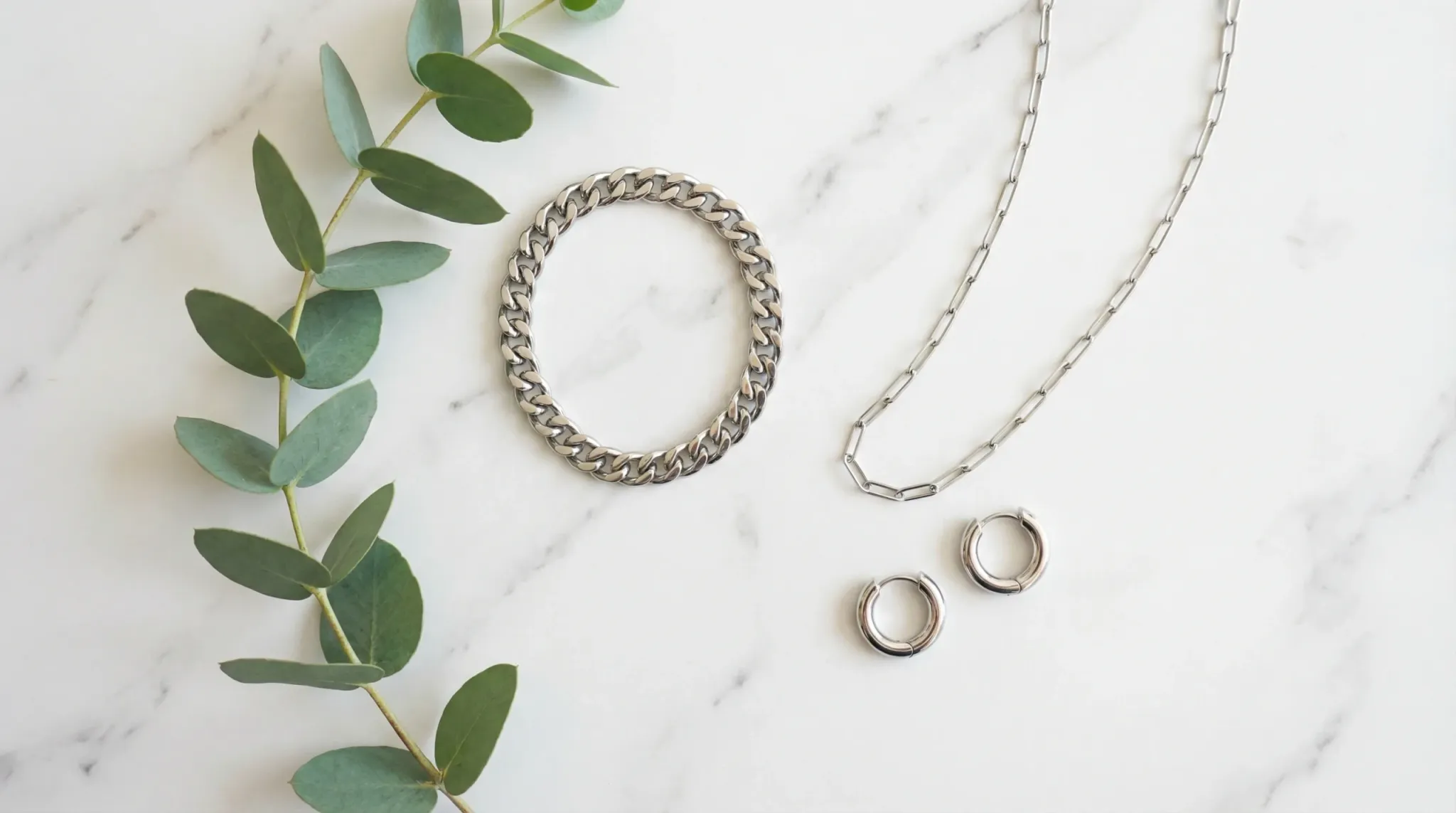 stainless steel jewelry flatlay index 32752x1536