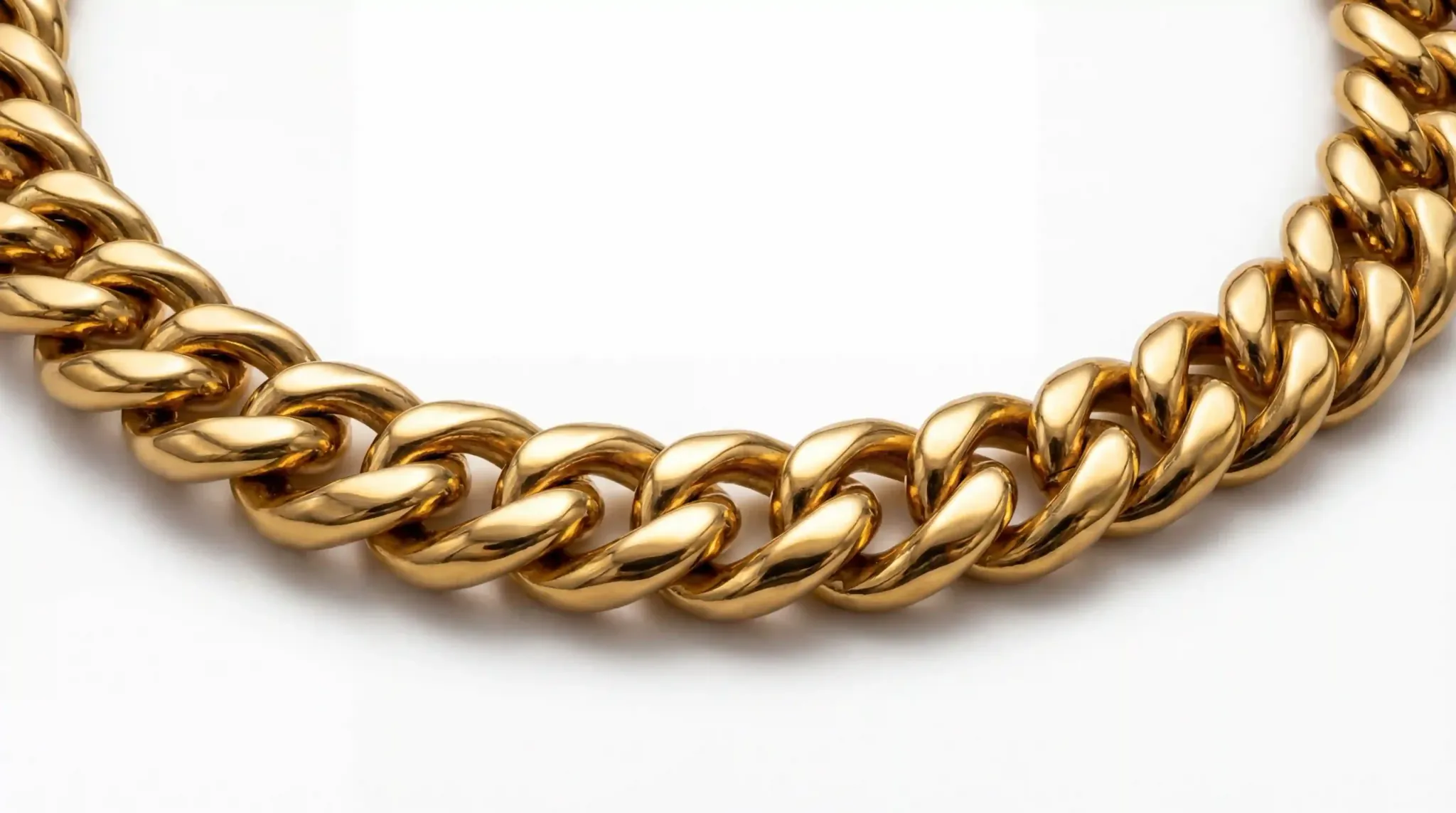 Close-up of a high-shine 18k gold cuban link chain made of stainless steel