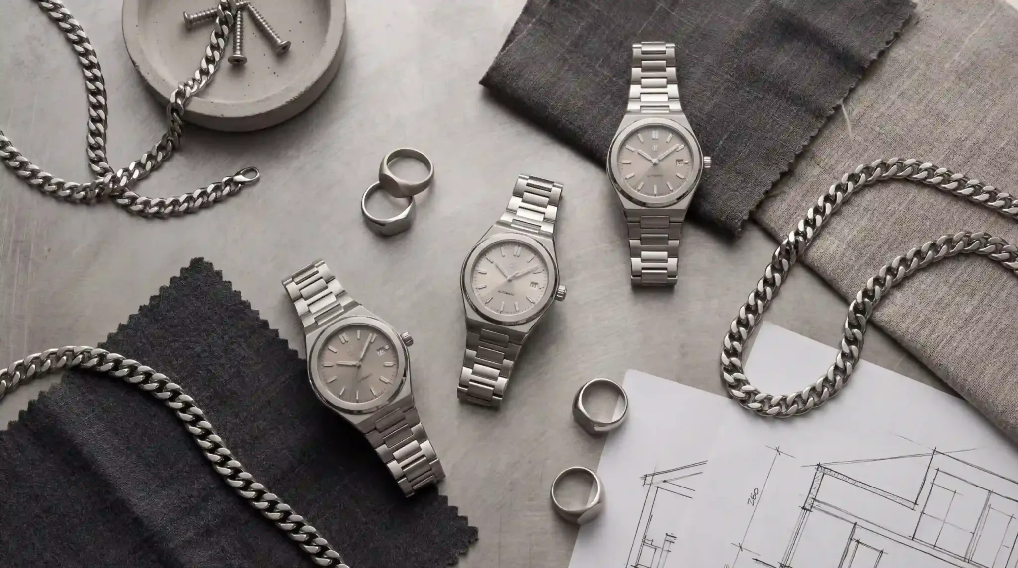 luxury steel accessories flatlay index 34096x2286