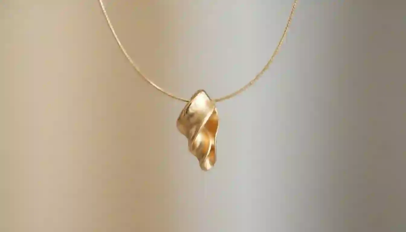 quiet luxury charm necklace macro index 11344x768