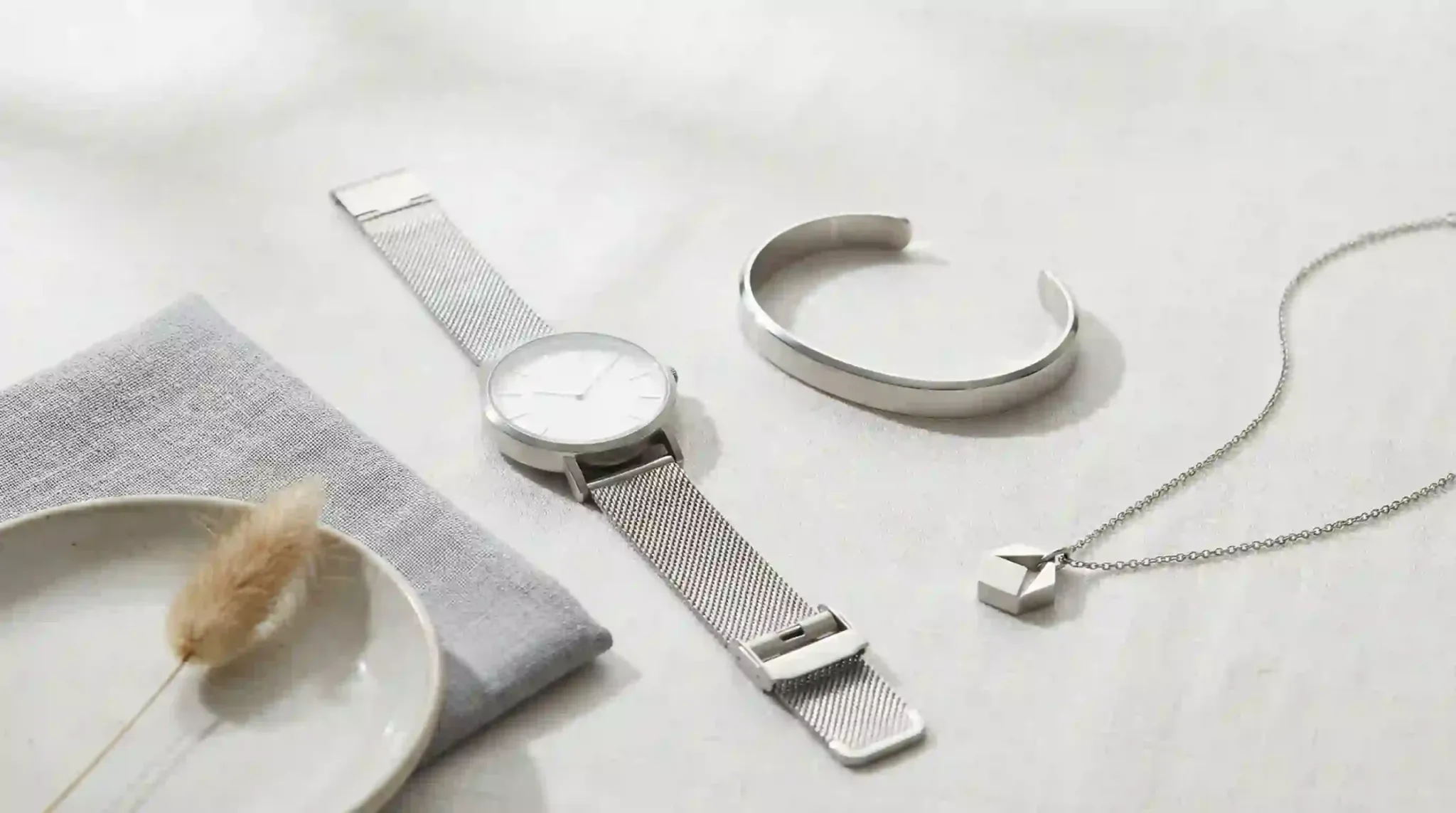 stainless steel lifestyle products flatlay index 32752x1536