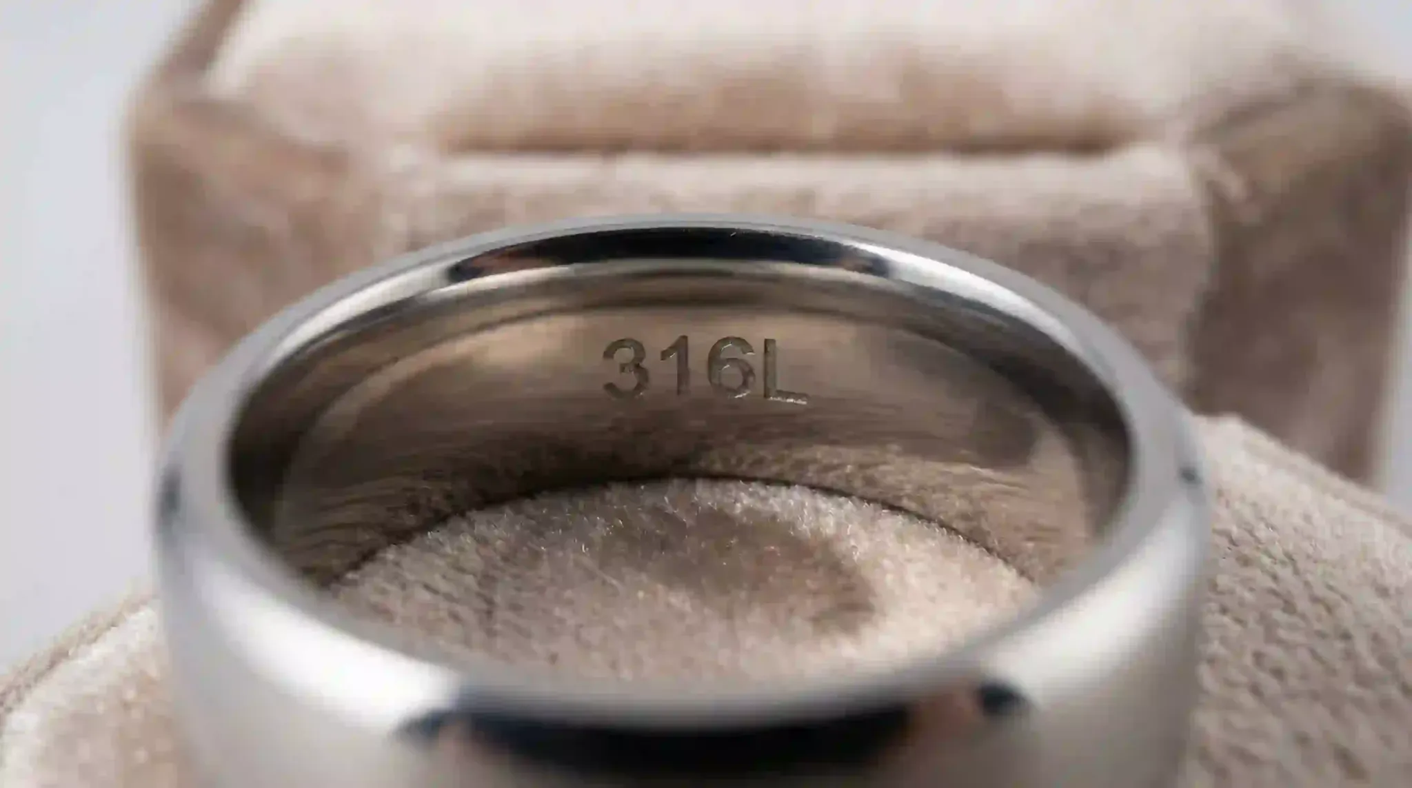 A macro view of a 316L hallmark inside a high-quality ring
