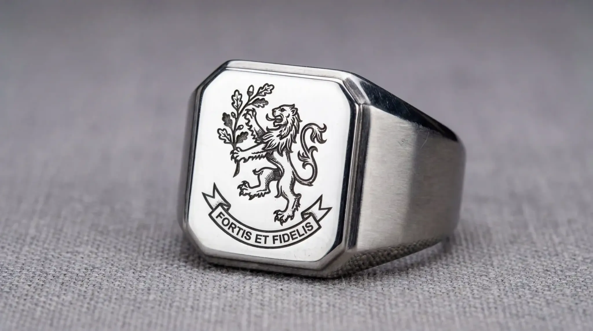 Custom engraved coat-of-arms on a stainless steel ring